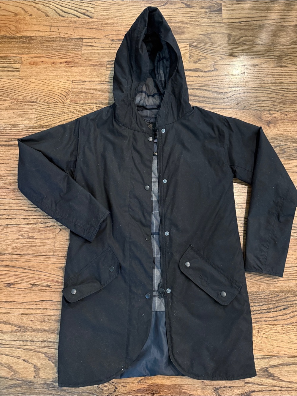 Women’s Black Waxed Hooded Barbour Jacked